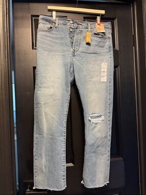 Levi's Light Blue Straight Leg Jeans with Distressed Knee